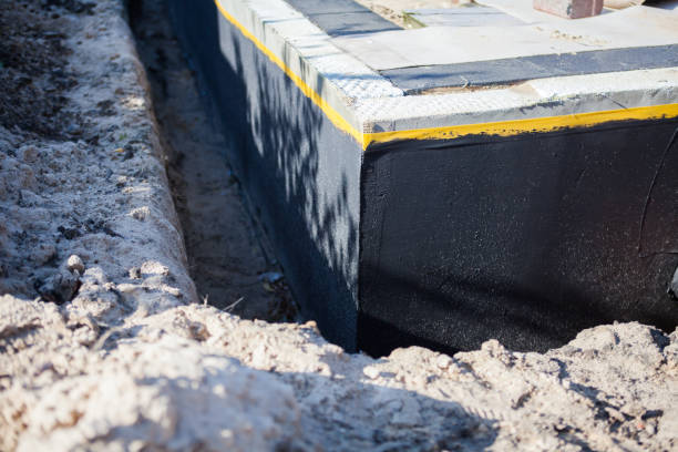 Professional Waterproofing technician working in Little Falls, NJ